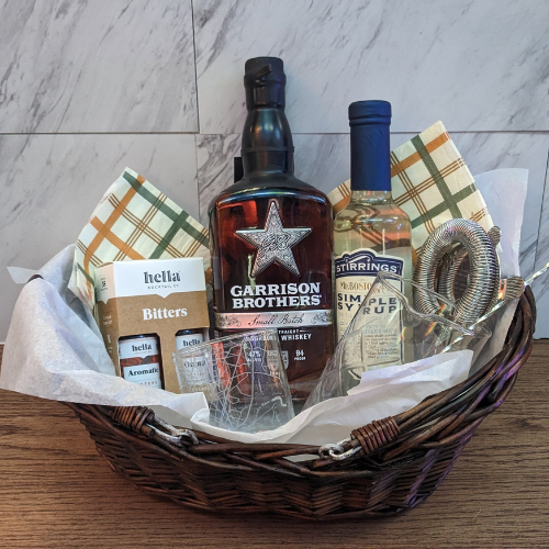 Austin Whiskey Gift Basket with bar tools, bitters, and Austin-themed glass