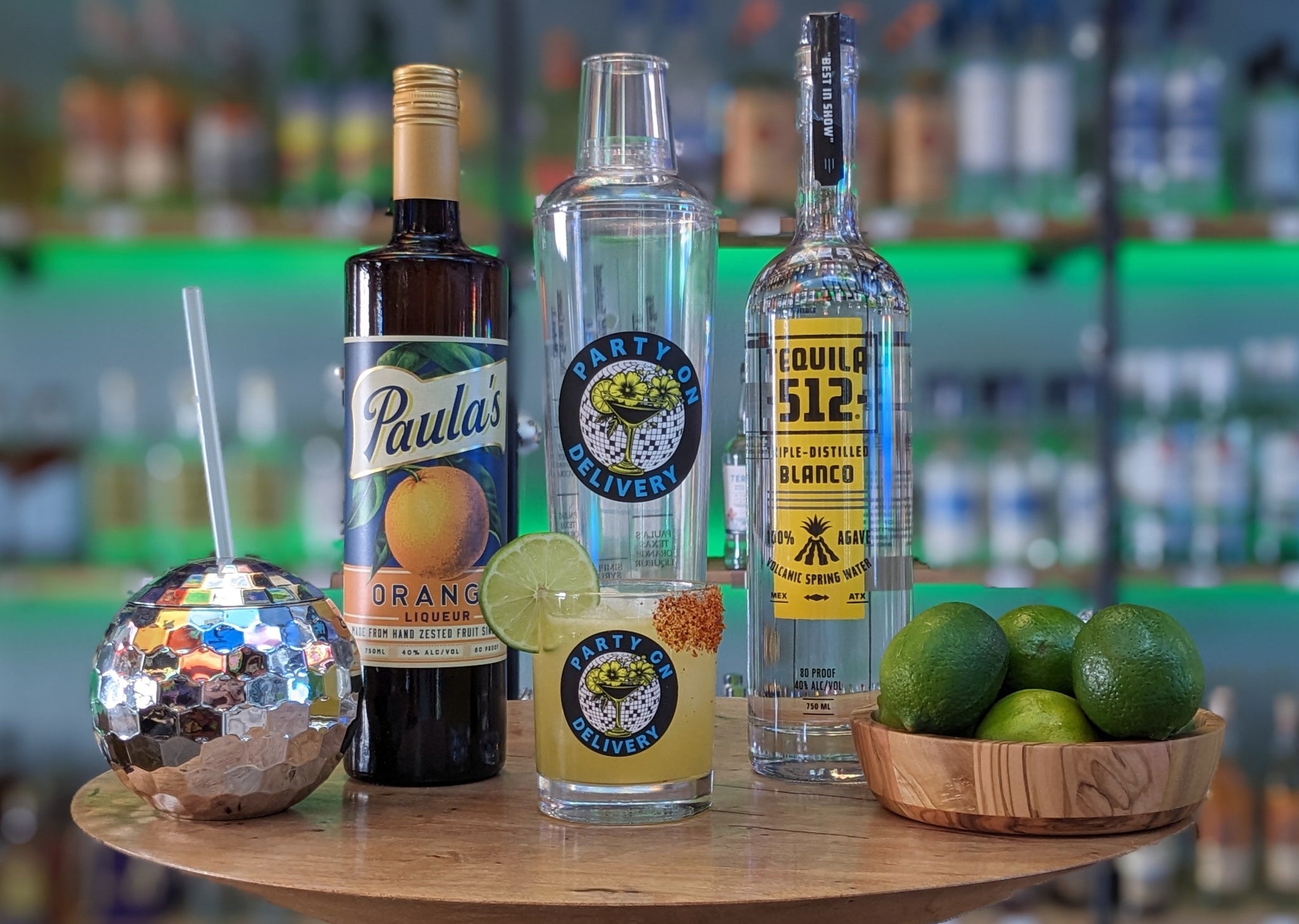 Classic margarita cocktail kit ingredients - tequila, lime, orange liqueur