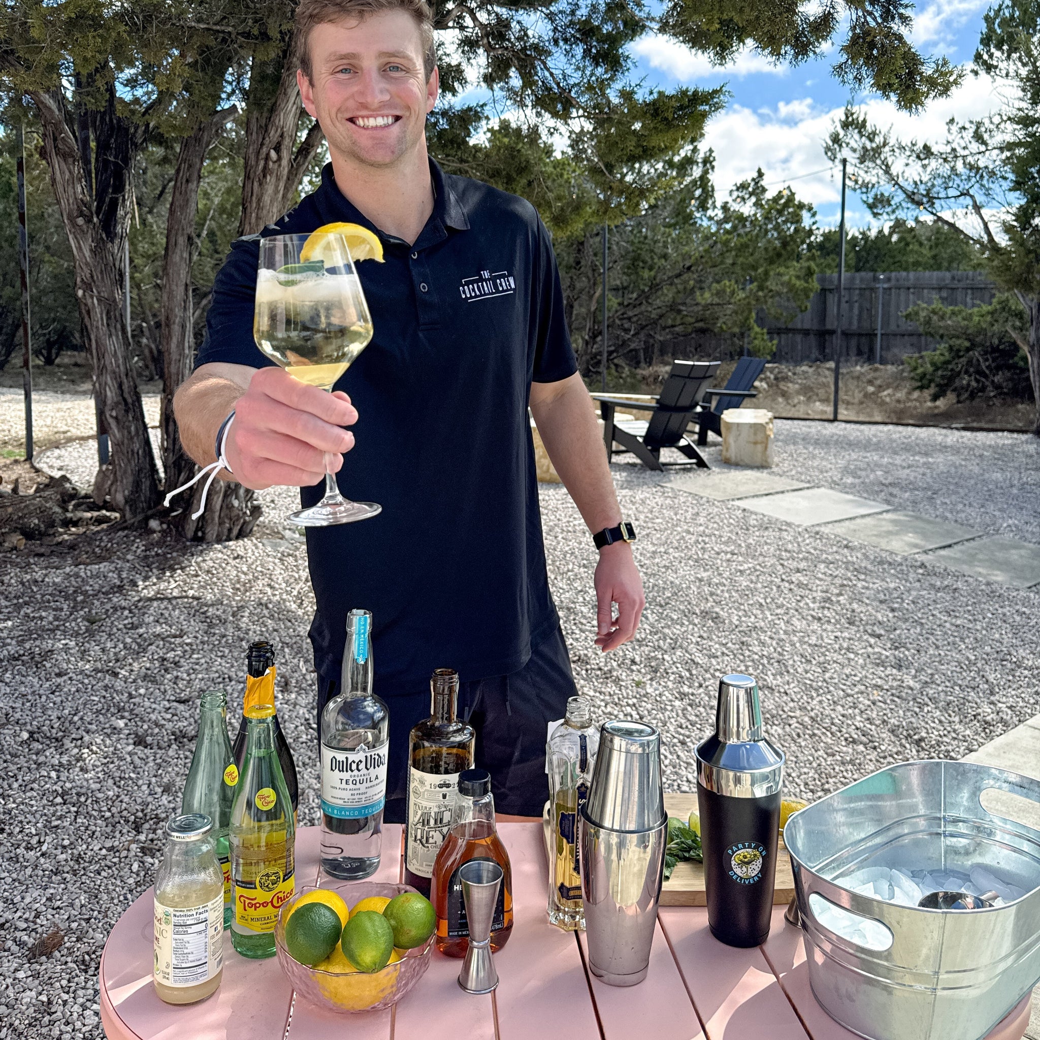 Hugo Spritz cocktail in wine glass with mint garnish