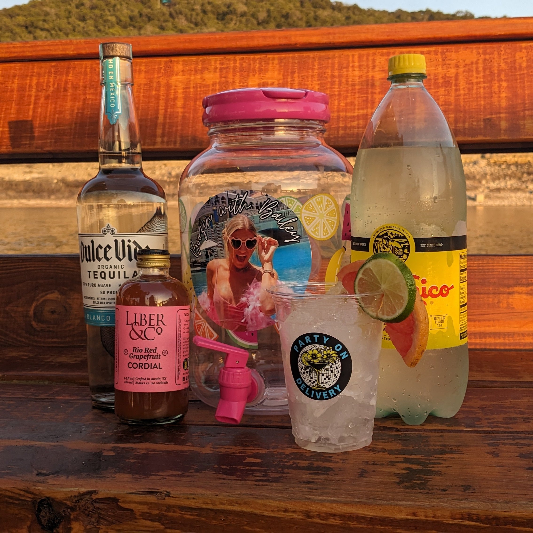 Paloma cocktail in glass with lime and Tajin rim