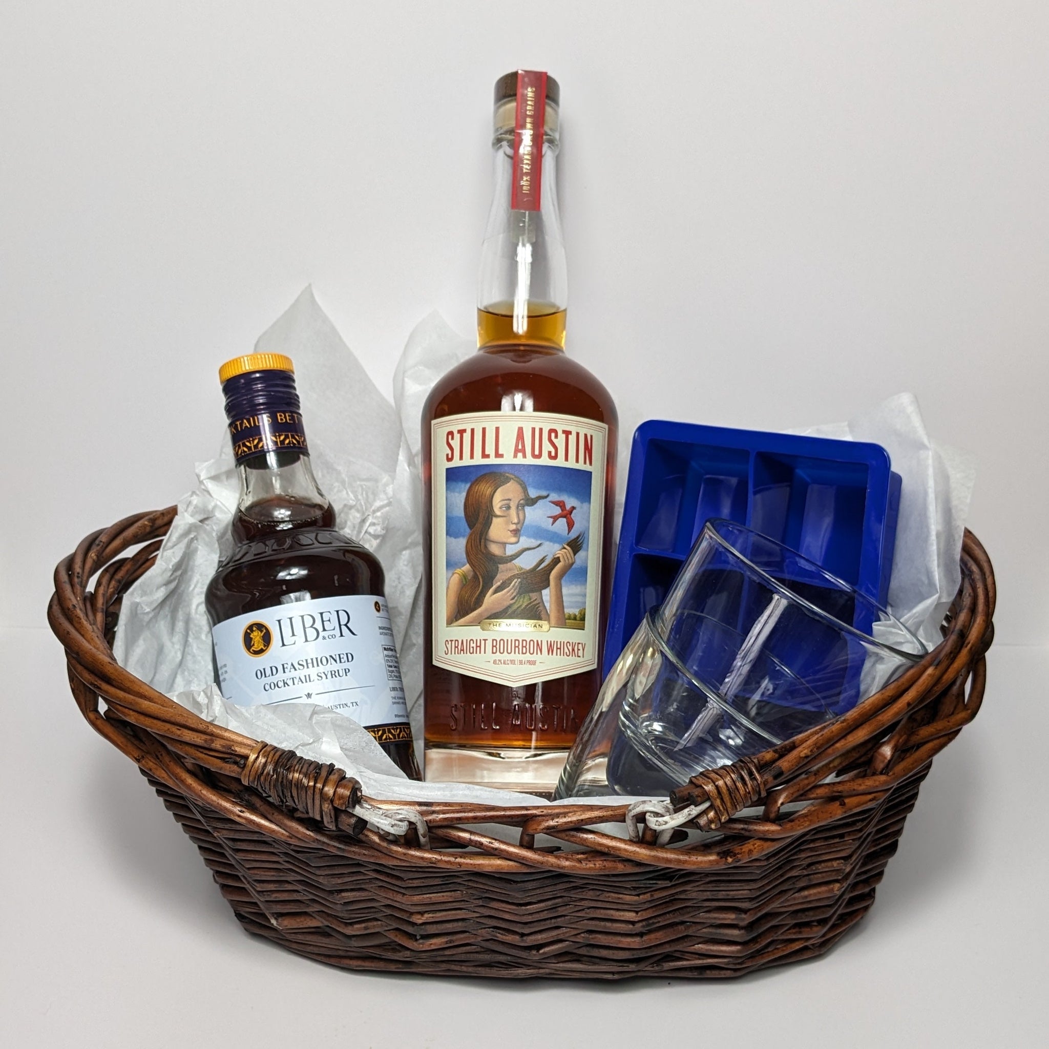 Still Austin Old-Fashioned Gift Basket with bourbon, rocks glasses, and syrup